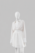 A semi-fitted dress with an accentuated waist