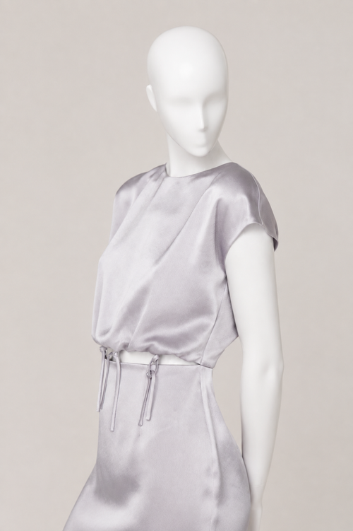 A moderate volume slim fit dress.